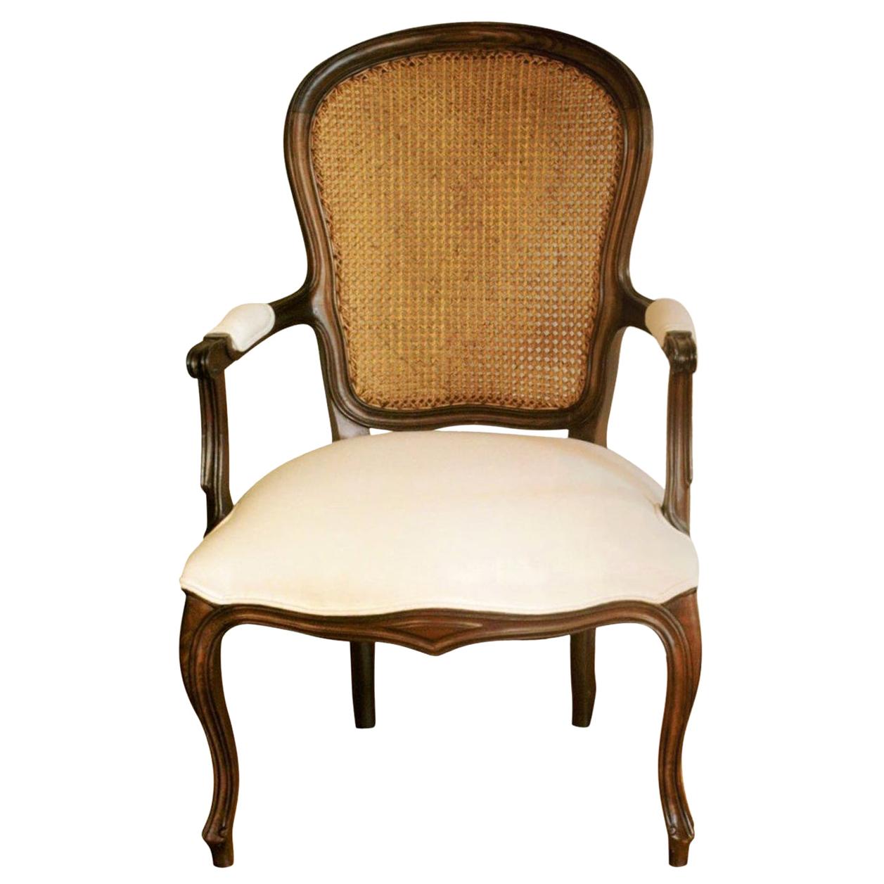 French Louis XVI Style Armchair Carved Walnut with Caned Backrest For Sale
