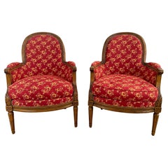 French Louis XVI Style Bergere Walnut Armchair in Red Upholstery, a Pair 