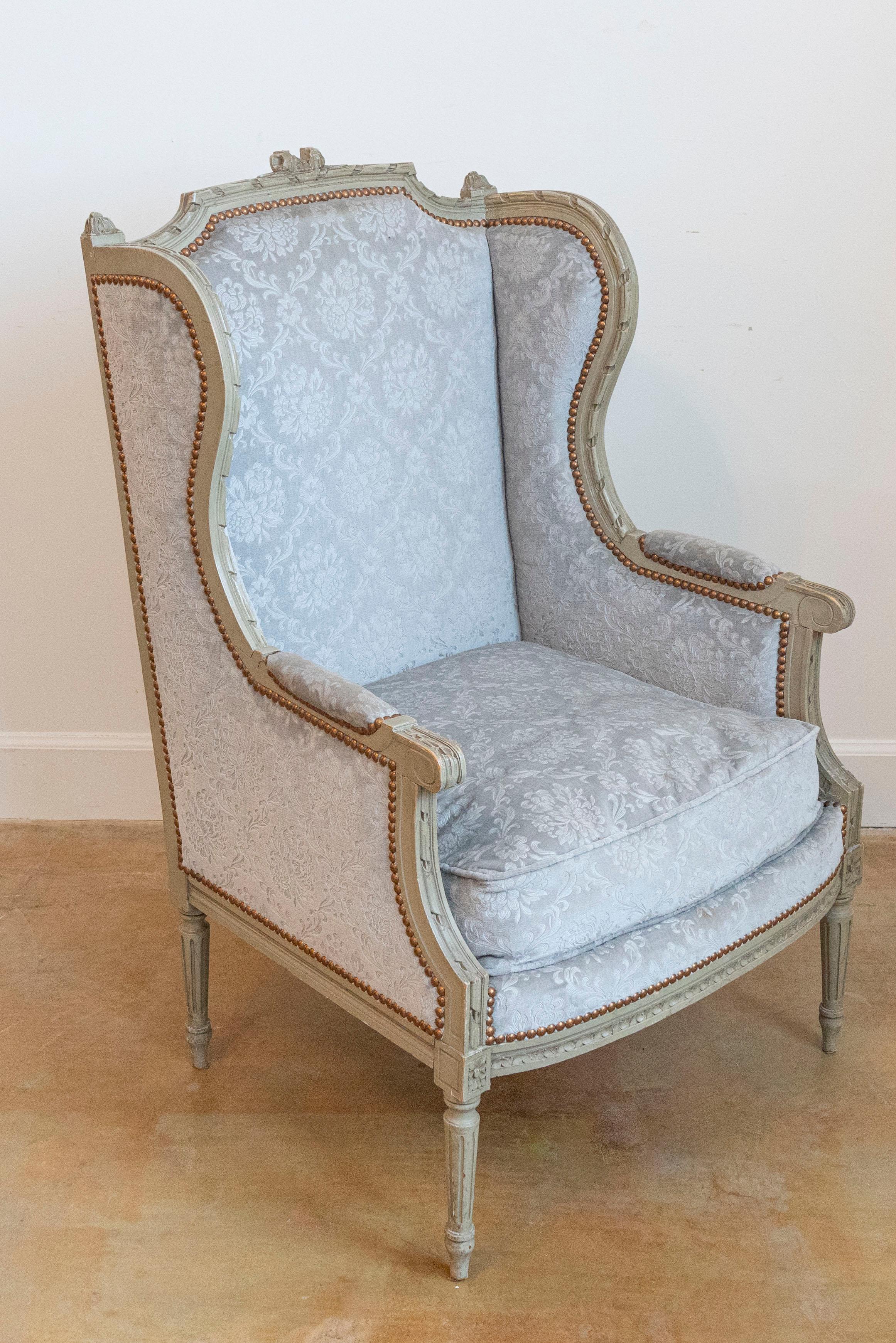 20th Century French Louis XVI Style Bergères À Oreilles with Carved Motifs and Upholstery For Sale