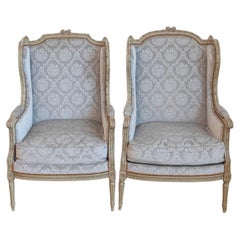 French Louis XVI Style Bergères À Oreilles with Carved Motifs and Upholstery