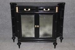 French Louis XVI Style Black Ebonized Cabinet with Distressed Mirrored Panels