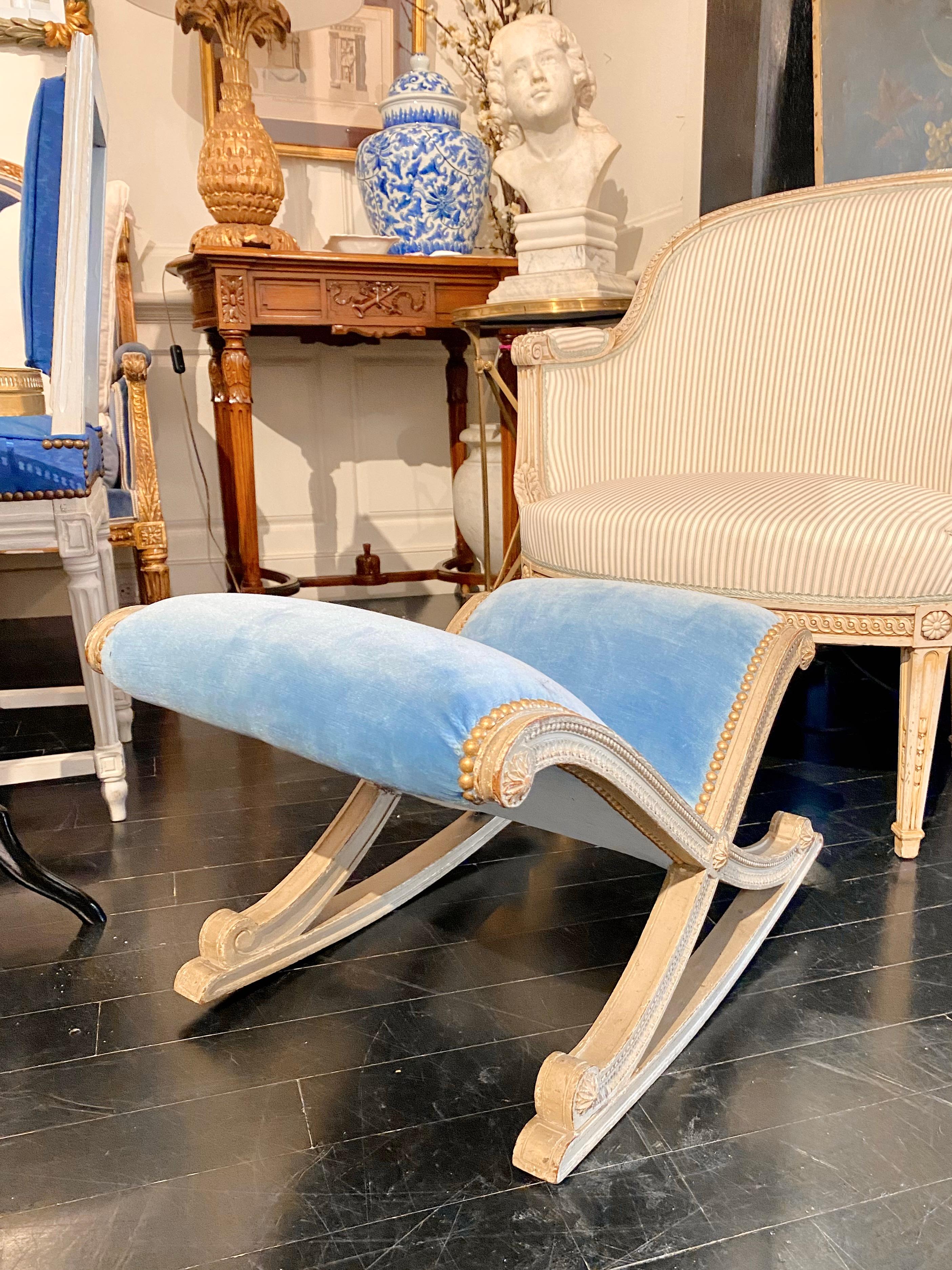 This unique piece was created in the 19th century. It resembles the footstool that graced the private upstairs sitting room of the Parisian home of the Duke and Duchess of Windsor (see image 20). This Louis XVI style tabouret features carved wood