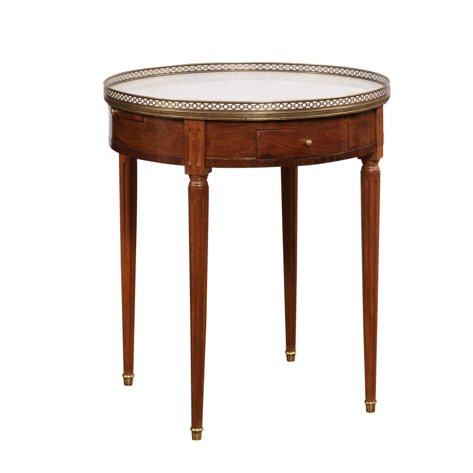 Carved French Louis XVI Style Bouillotte Table with White Marble Top and Brass Gallery