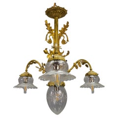 Antique French Louis XVI Style Bronze and Clear Cut Glass Four-Light Chandelier