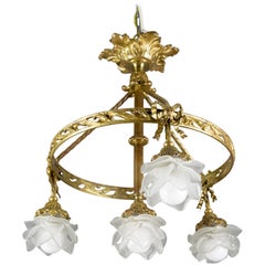 French Louis XVI Style Bronze and Frosted Glass Four-Light Chandelier, 1920s