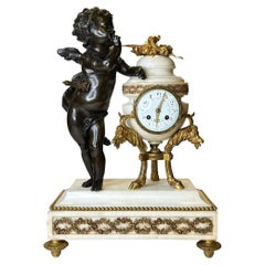  French Louis XVI style Bronze and Marble Mantel Clock by Ferdinand Gervais