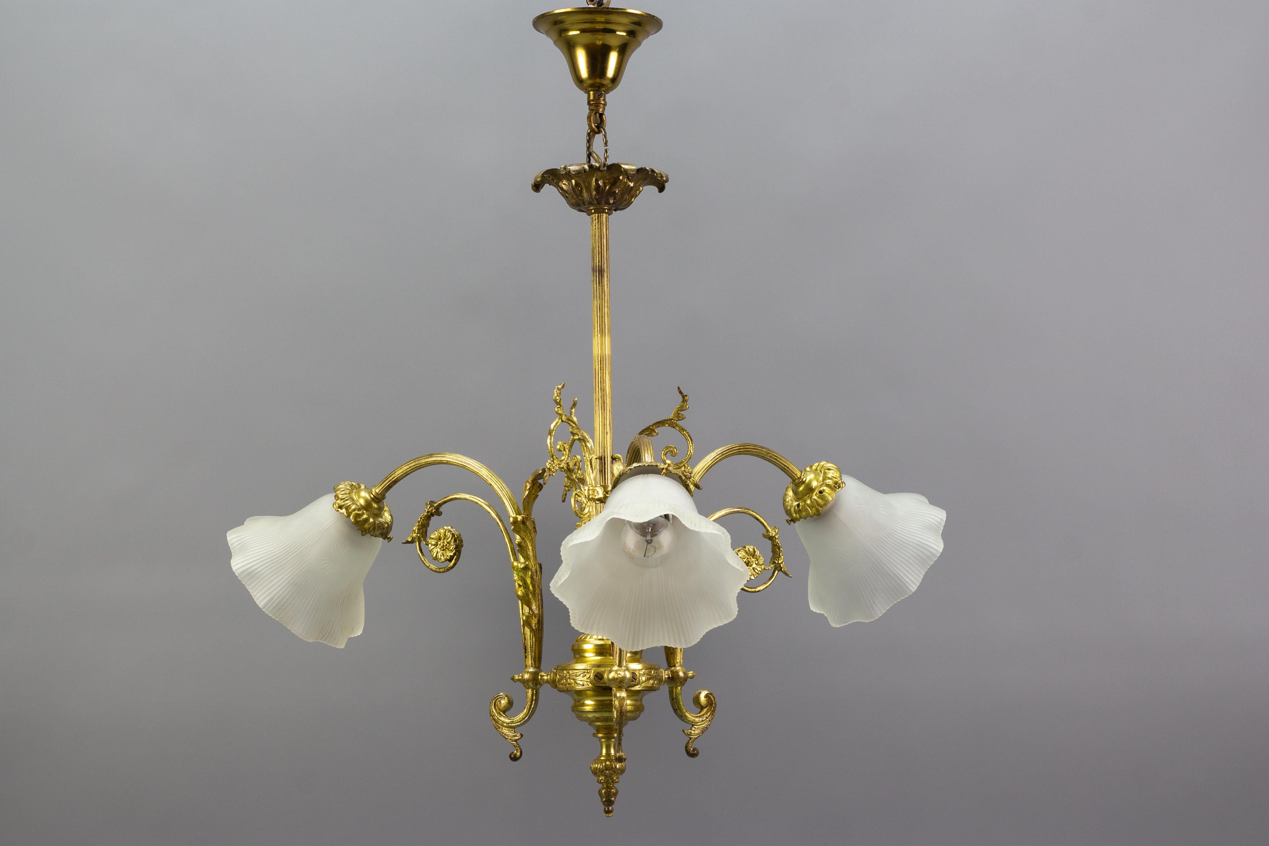 Early 20th Century French Louis XVI Style Bronze and White Frosted Glass Three-Light Chandelier