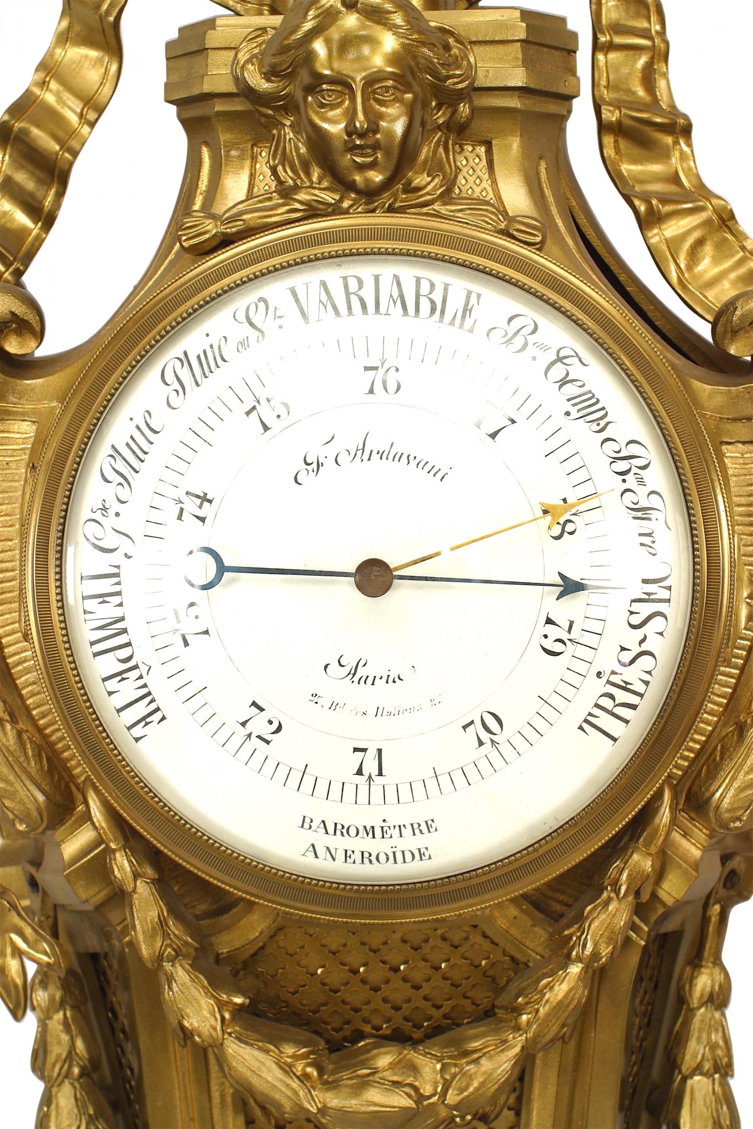 French Louis XVI-style bronze wall barometer with an urn finial top with a head above the round dial and draped with a ribbon design.