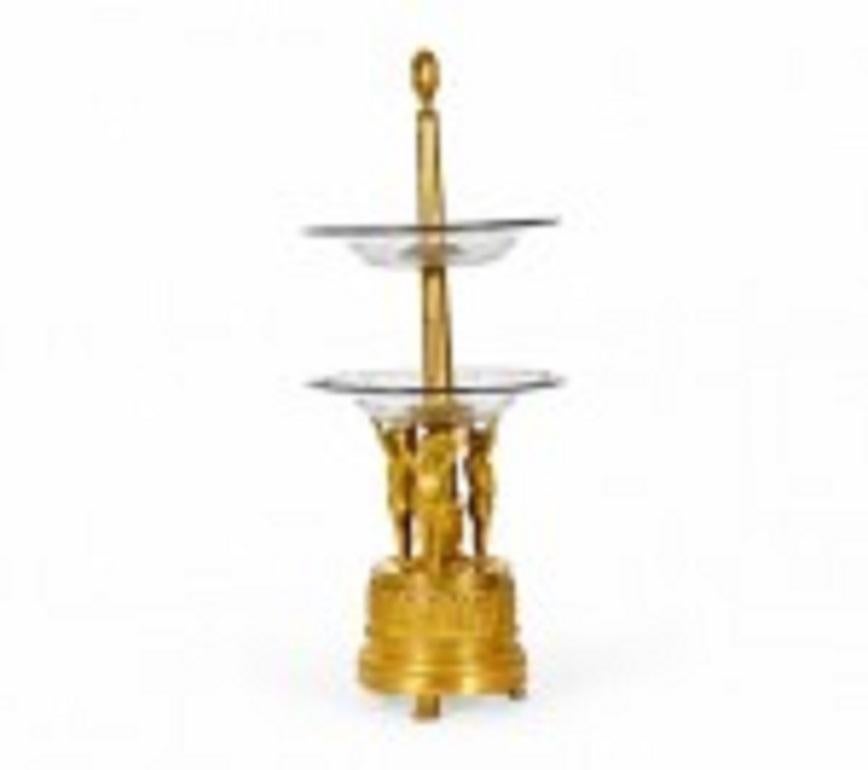 French Louis XVI-style (19th Century) bronze dore centerpiece with 3 cupids holding 2 etched glass tiers with wreath top.
