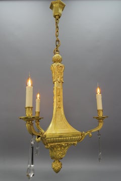 Lustre à trois lumières en bronze de style Louis XVI, début du 20e siècle