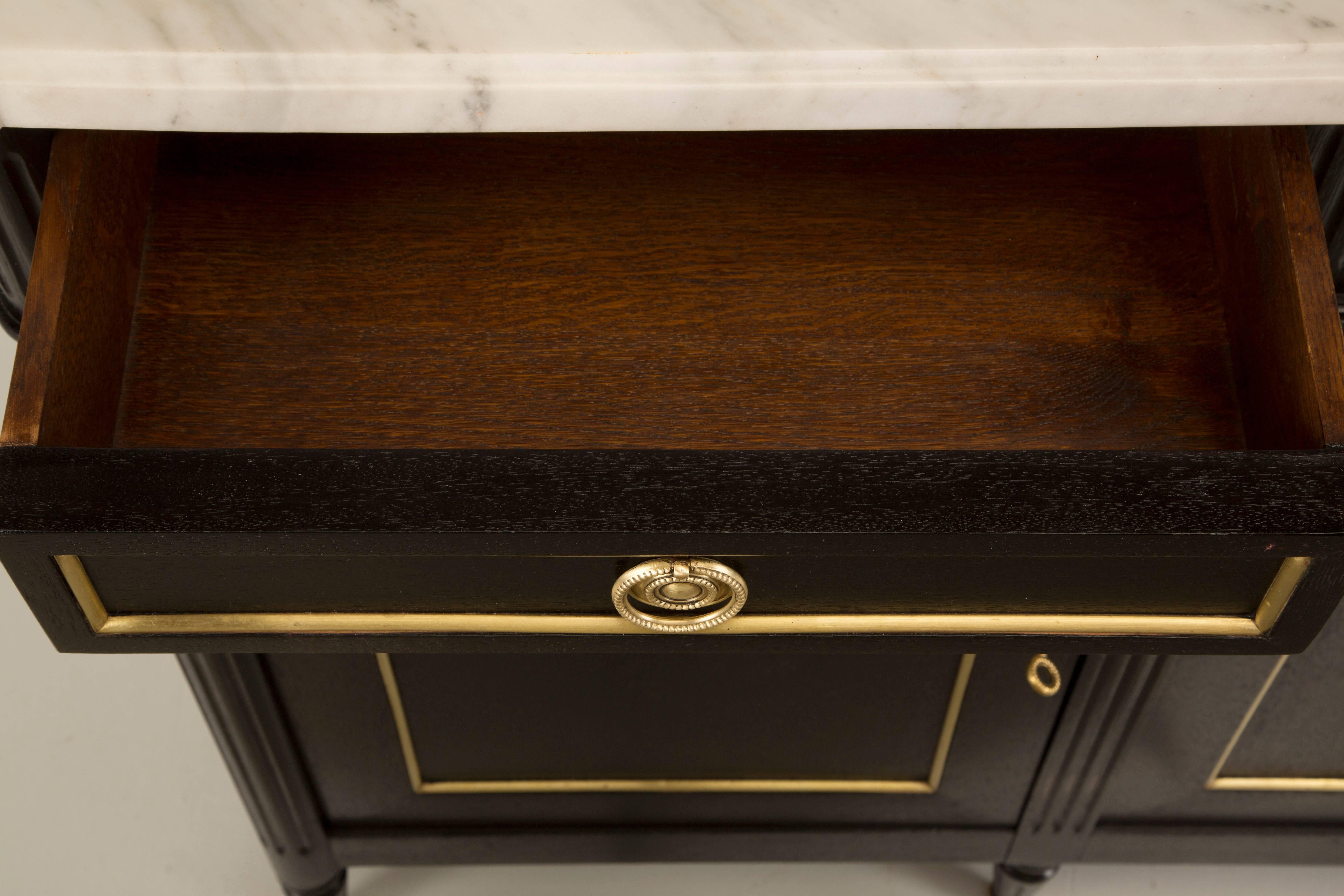 French Louis XVI Style Buffet in an Ebonized Finish with a White Marble Top In Good Condition In Chicago, IL