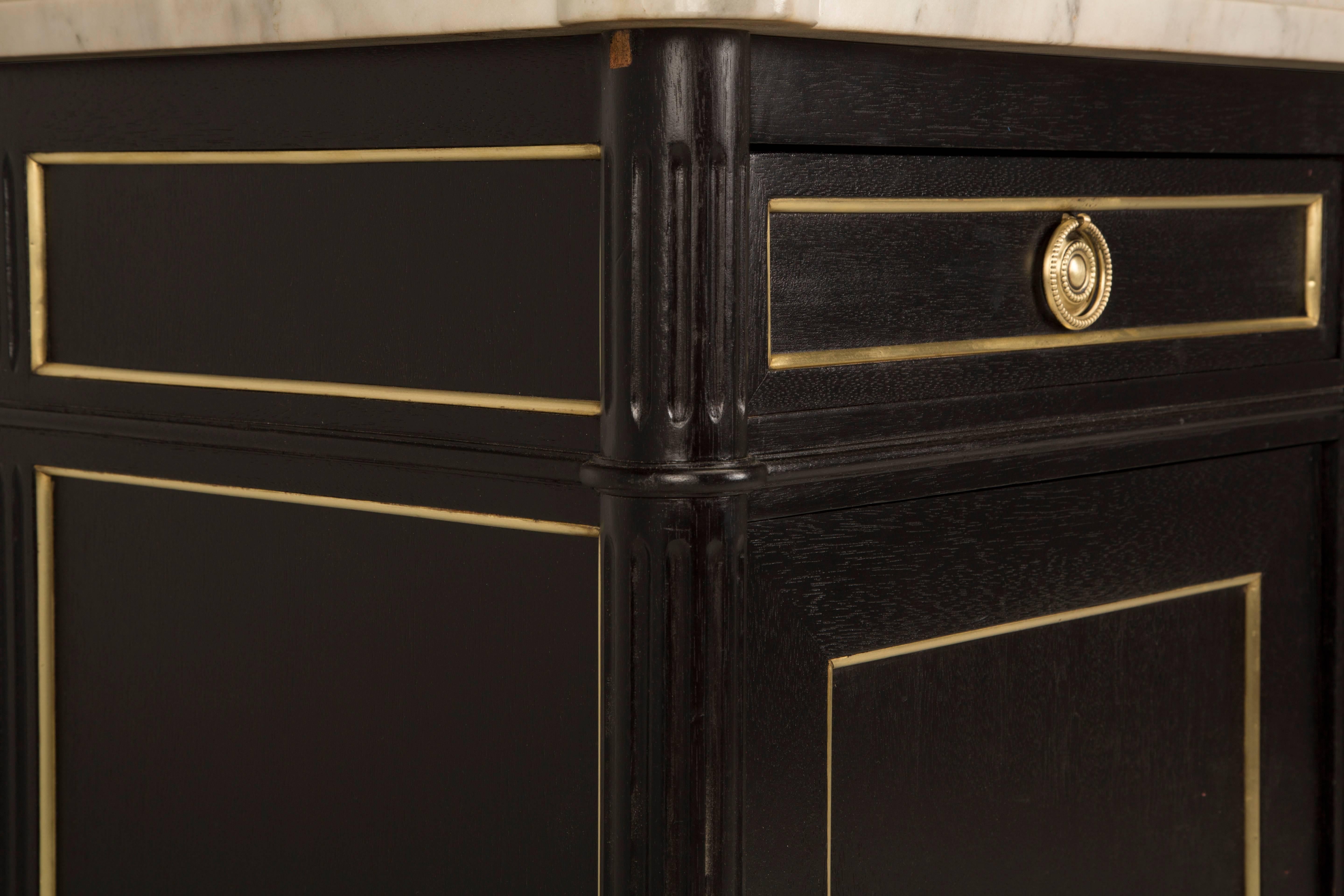 Mid-20th Century French Louis XVI Style Buffet in an Ebonized Finish with a White Marble Top