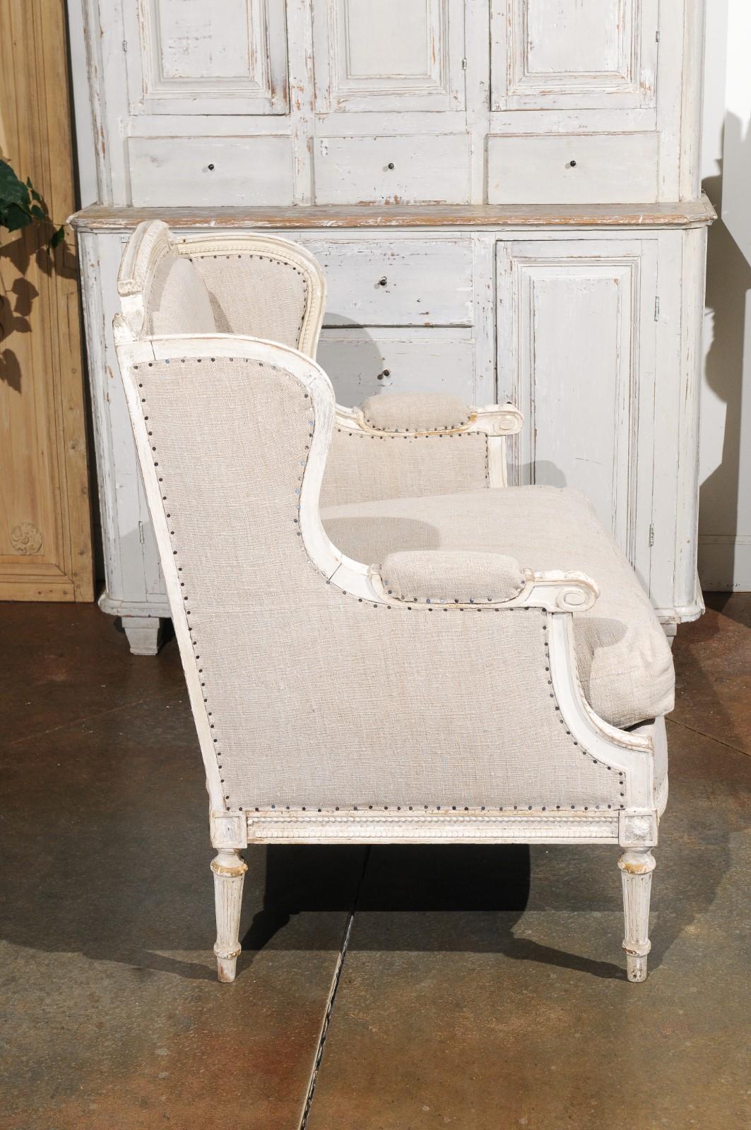 French Louis XVI Style Carved and Painted Wood Marquise Wingback Armchair For Sale 1