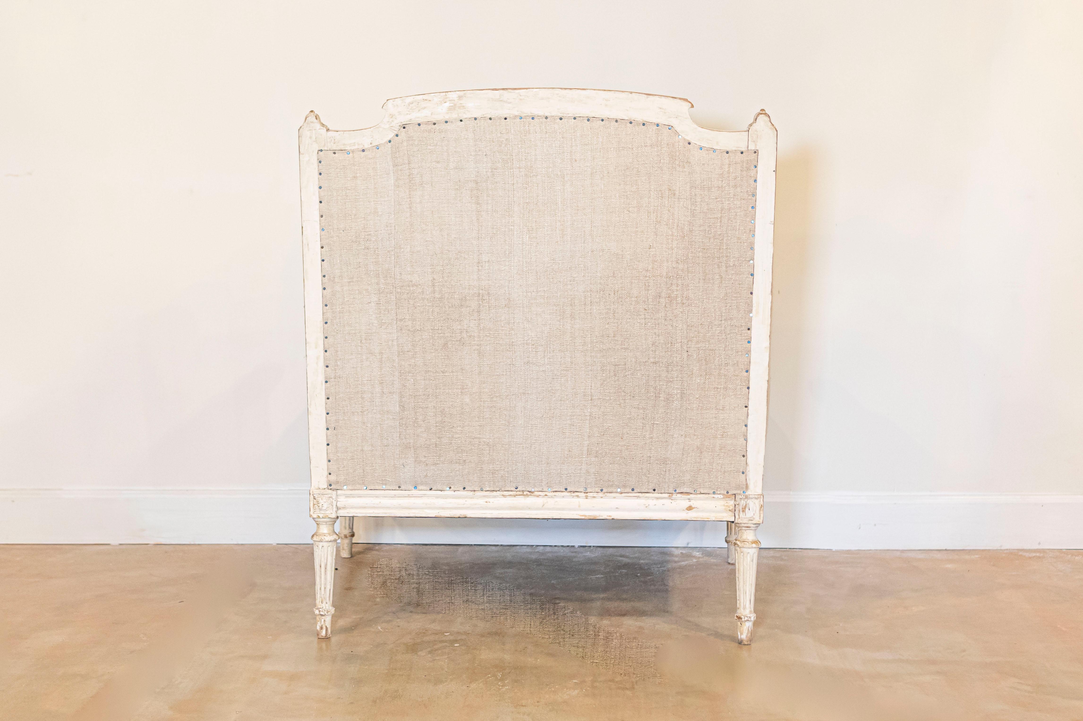Upholstery French Louis XVI Style Carved and Painted Wood Marquise Wingback Armchair For Sale