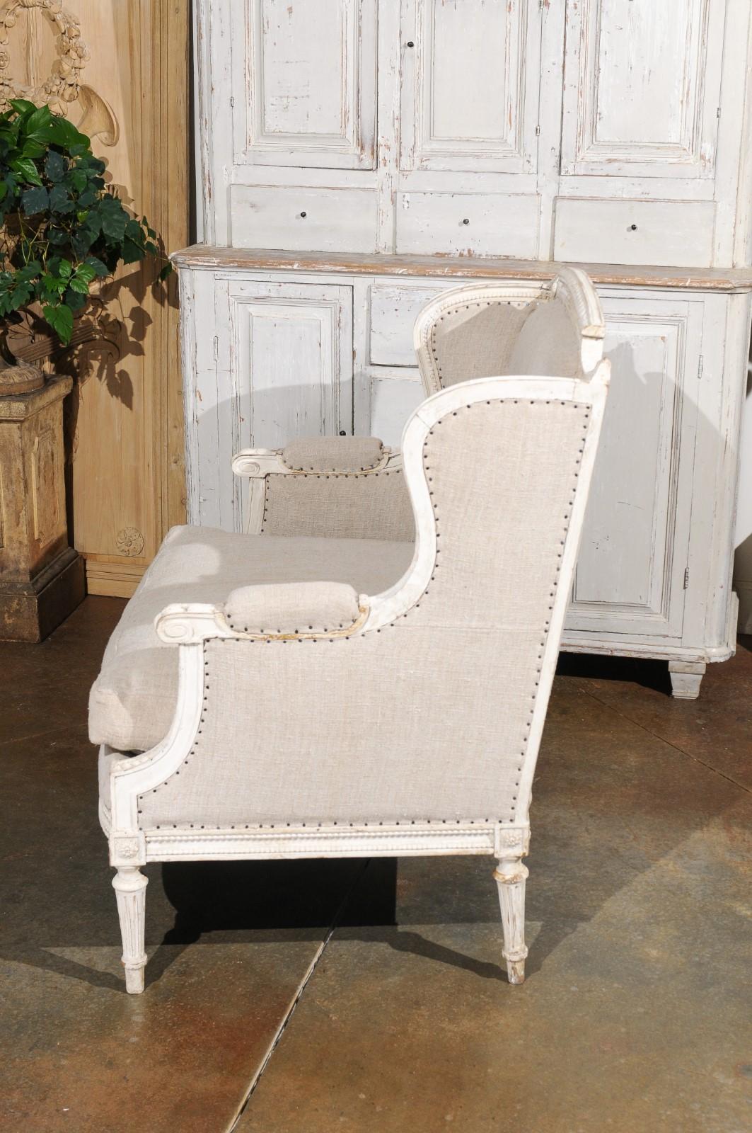 French Louis XVI Style Carved and Painted Wood Marquise Wingback Armchair For Sale 4