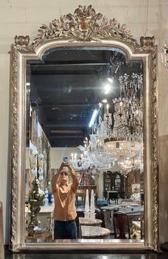 French Louis XVI Style Carved and Silver Leaf Mirror