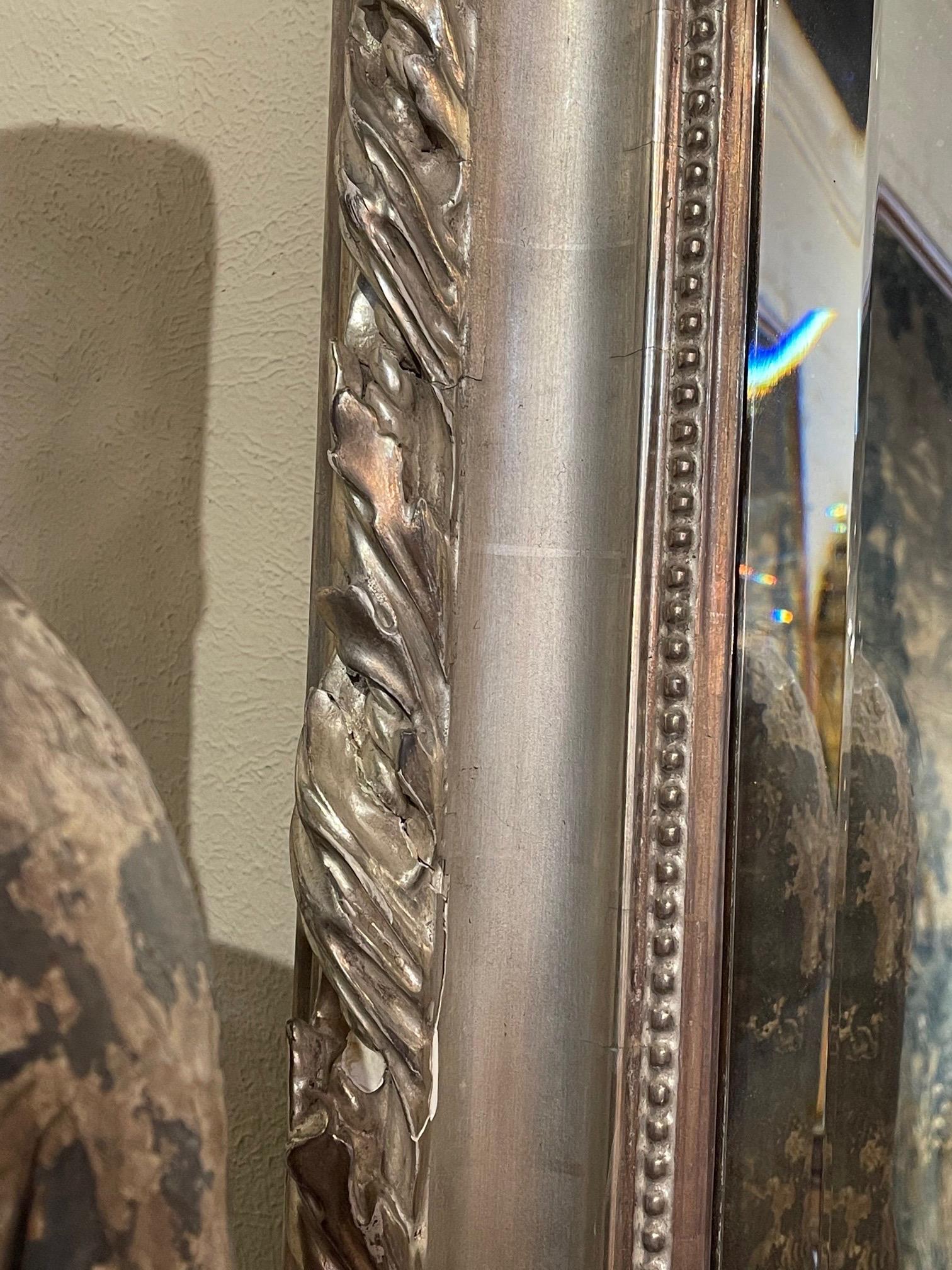Wood French Louis XVI Style Carved and Silver Leaf Mirror For Sale