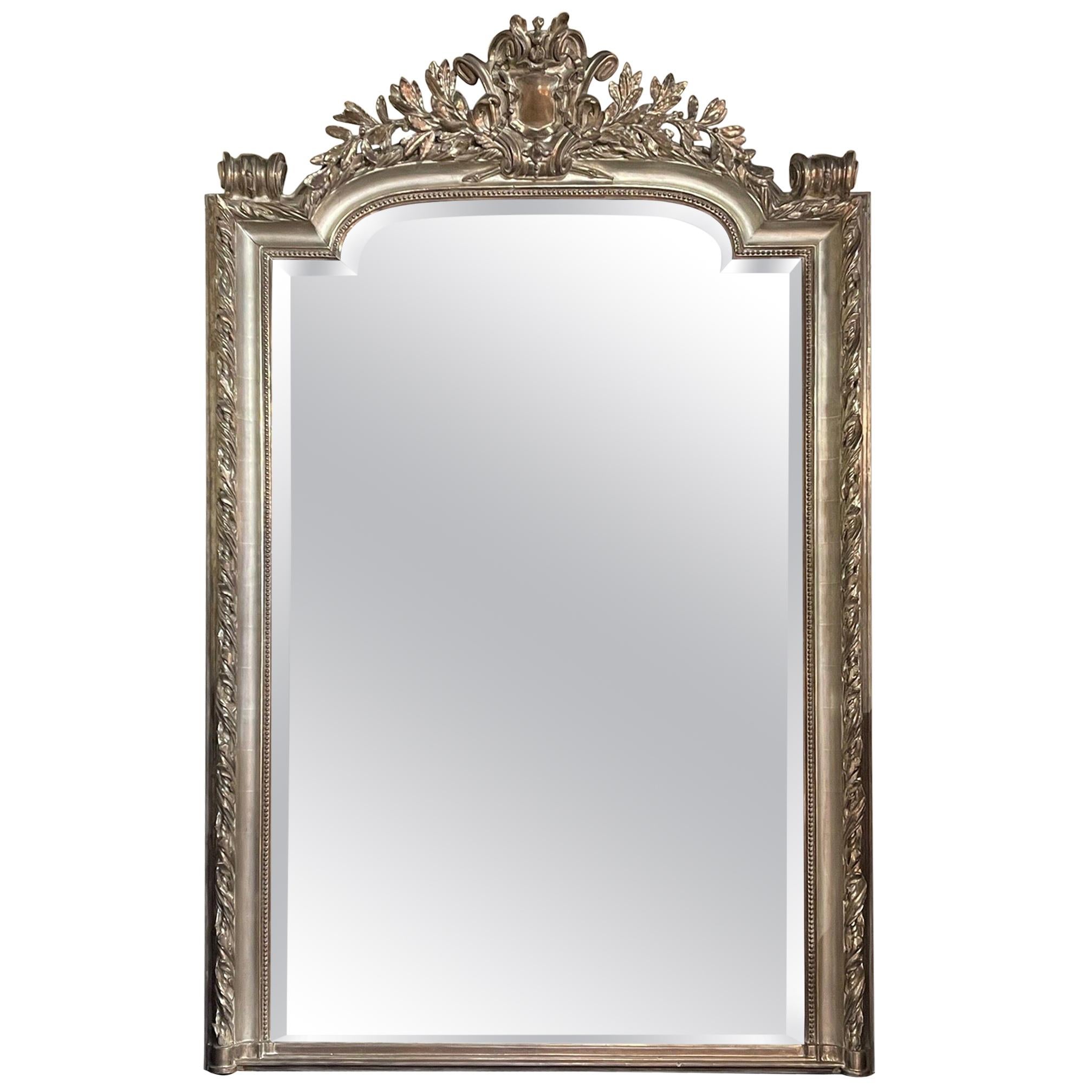 French Louis XVI Style Carved and Silver Leaf Mirror For Sale