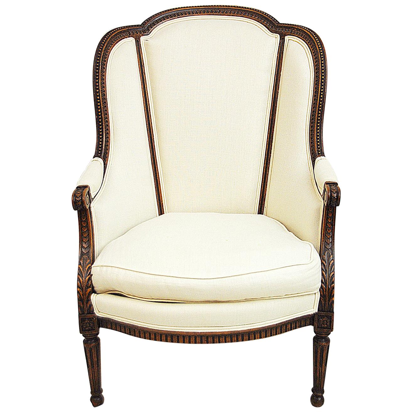 French Louis XVI Style Carved Beechwood Bergère Chair in Cream Colored Linen