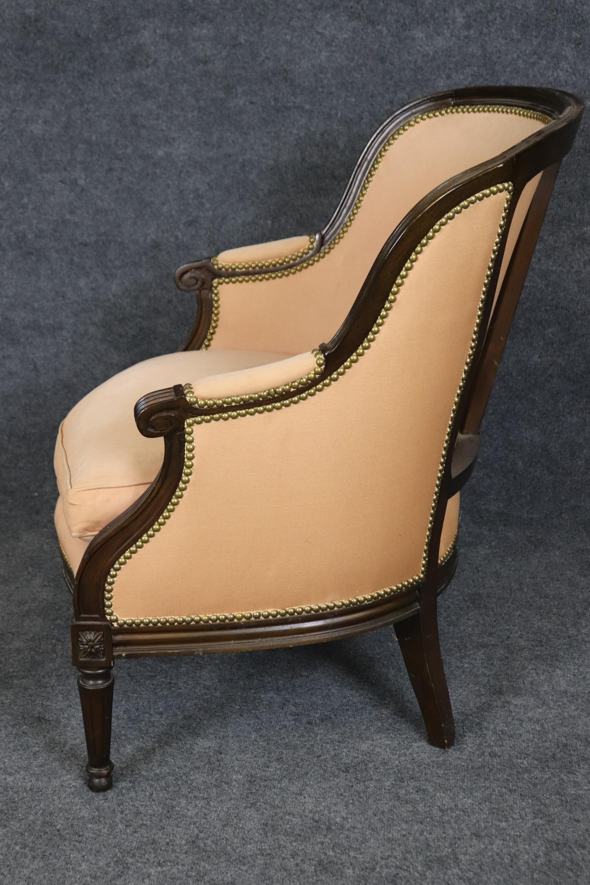 20th Century French Louis XVI Style Carved Bergere Chair with Pink Salmon Upholstery. For Sale