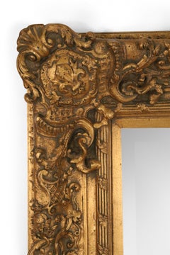 French Louis XVI Style Carved Giltwood Fleur-de-Lis Design Wall Mirror