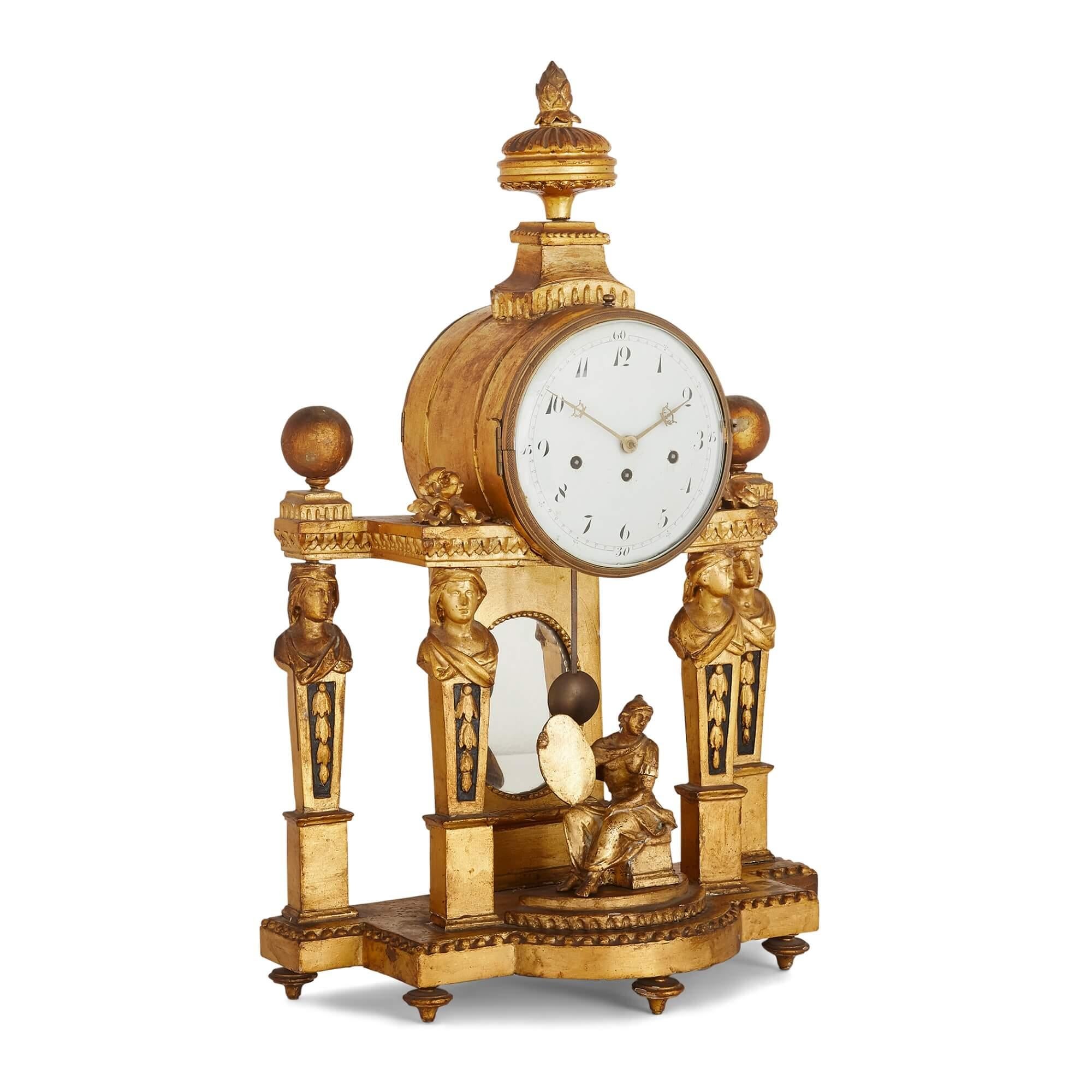 French Louis XVI style carved giltwood mantel clock
French, early 20th Century
Height 60cm, width 39cm, depth 18cm

This elegant mantel clock is crafted from giltwood and designed in a classical style. The clock features a large circular enamel dial