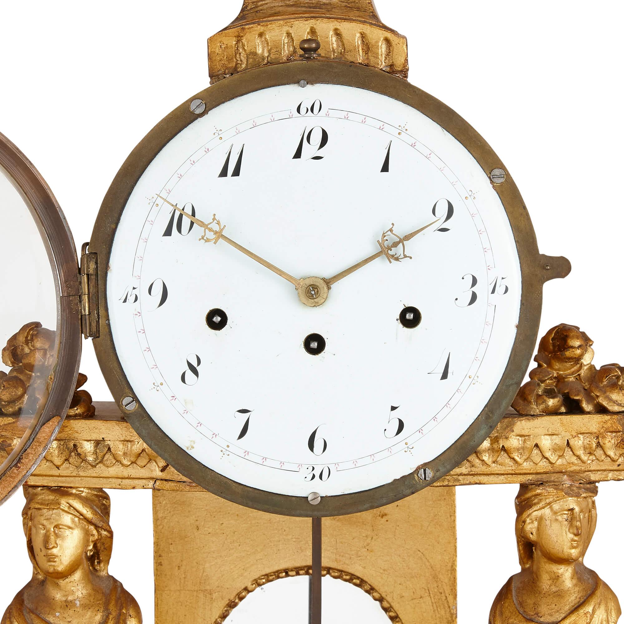 Neoclassical French Louis XVI style carved giltwood mantel clock For Sale