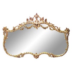 Specchio da parete francese in legno dorato intagliato in stile Luigi XVI