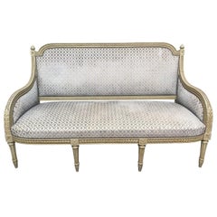 French Louis XVI Style Carved Wood Sofa with a Gray Green Painted Finish