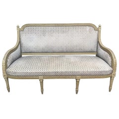 Used French Louis XVI Style Carved Wood Sofa with a Gray Green Painted Finish