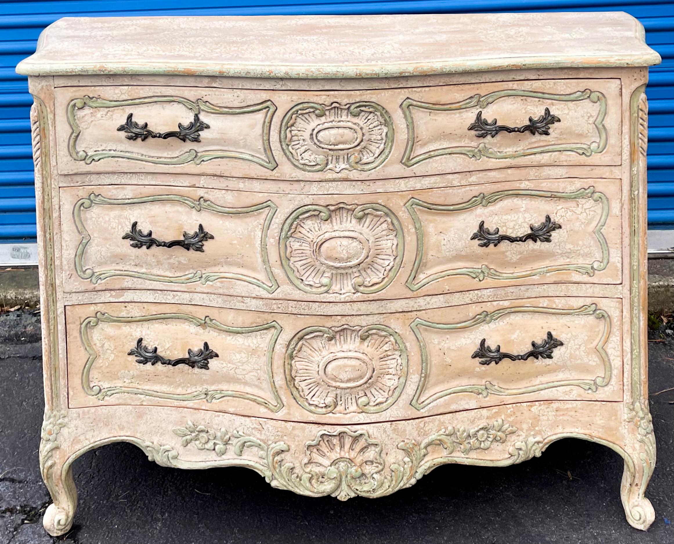 Love the finish and size! This chest is actually an Italian piece with French Louis XVI styling. The cerused finish is accented with a celadon green. It is in very good condition.