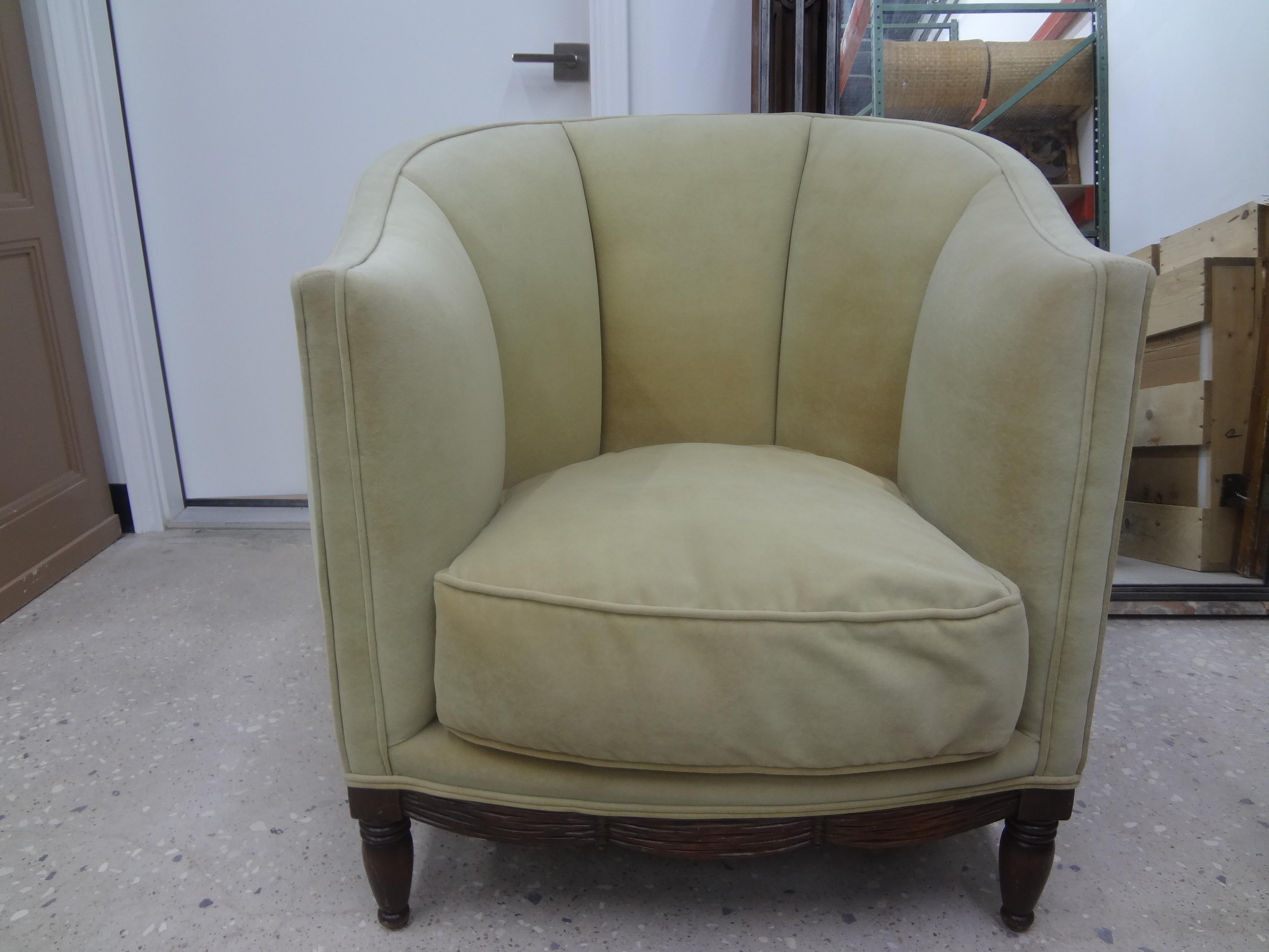 French Louis XVI style channel back bergere. This stunning and comfortable French walnut barrel back chair, club chair, side chair or tub chair has a lovely scrolled swag design around the entire chair and is upholstered in velvet with a down