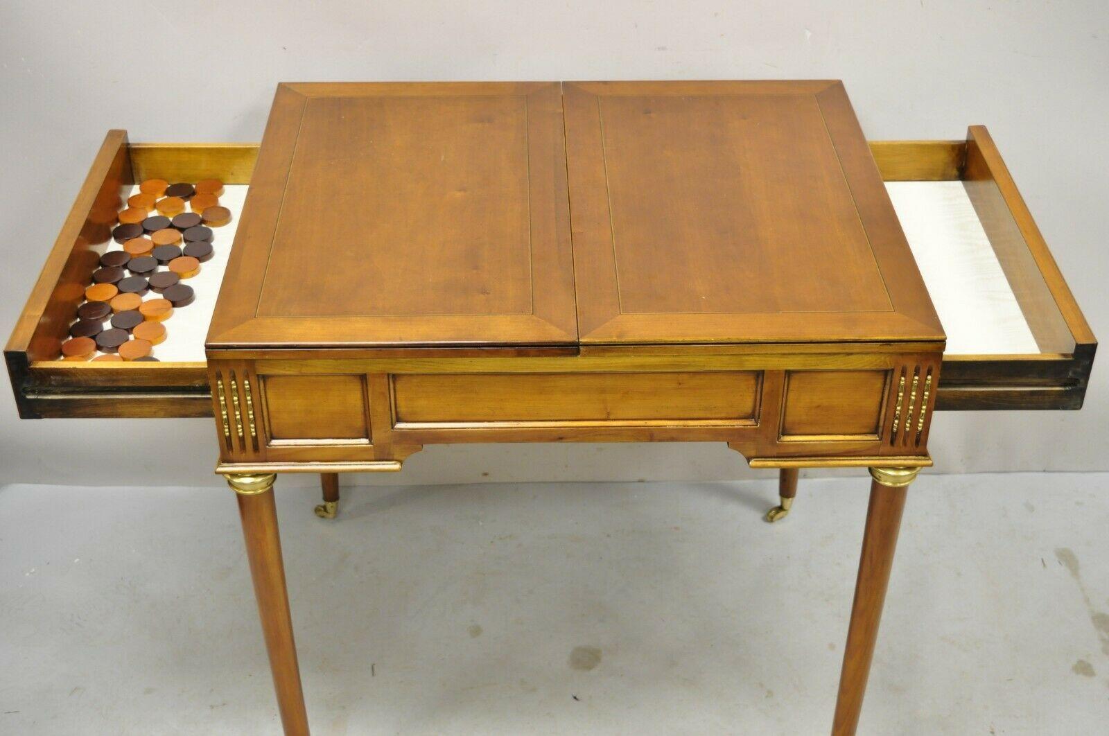 French Louis XVI Style Cherry Wood Flip Top Game Table with Brass Wheels In Good Condition For Sale In Philadelphia, PA