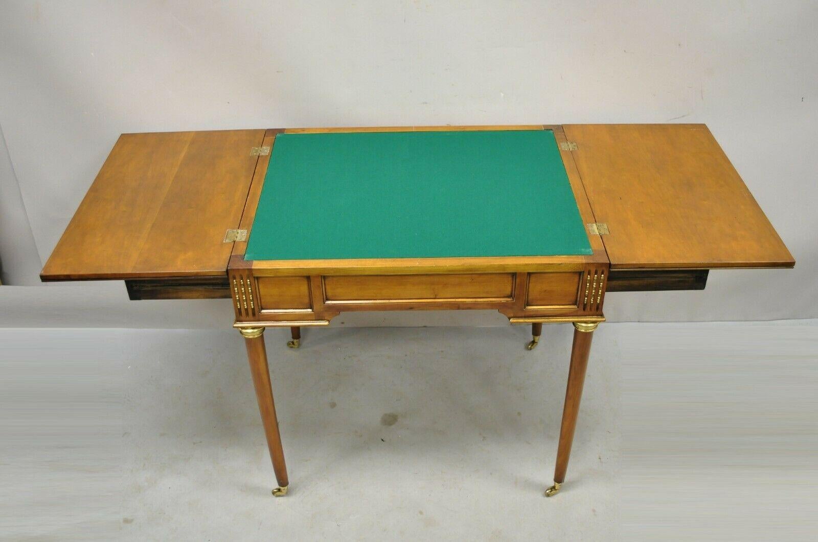 20th Century French Louis XVI Style Cherry Wood Flip Top Game Table with Brass Wheels For Sale