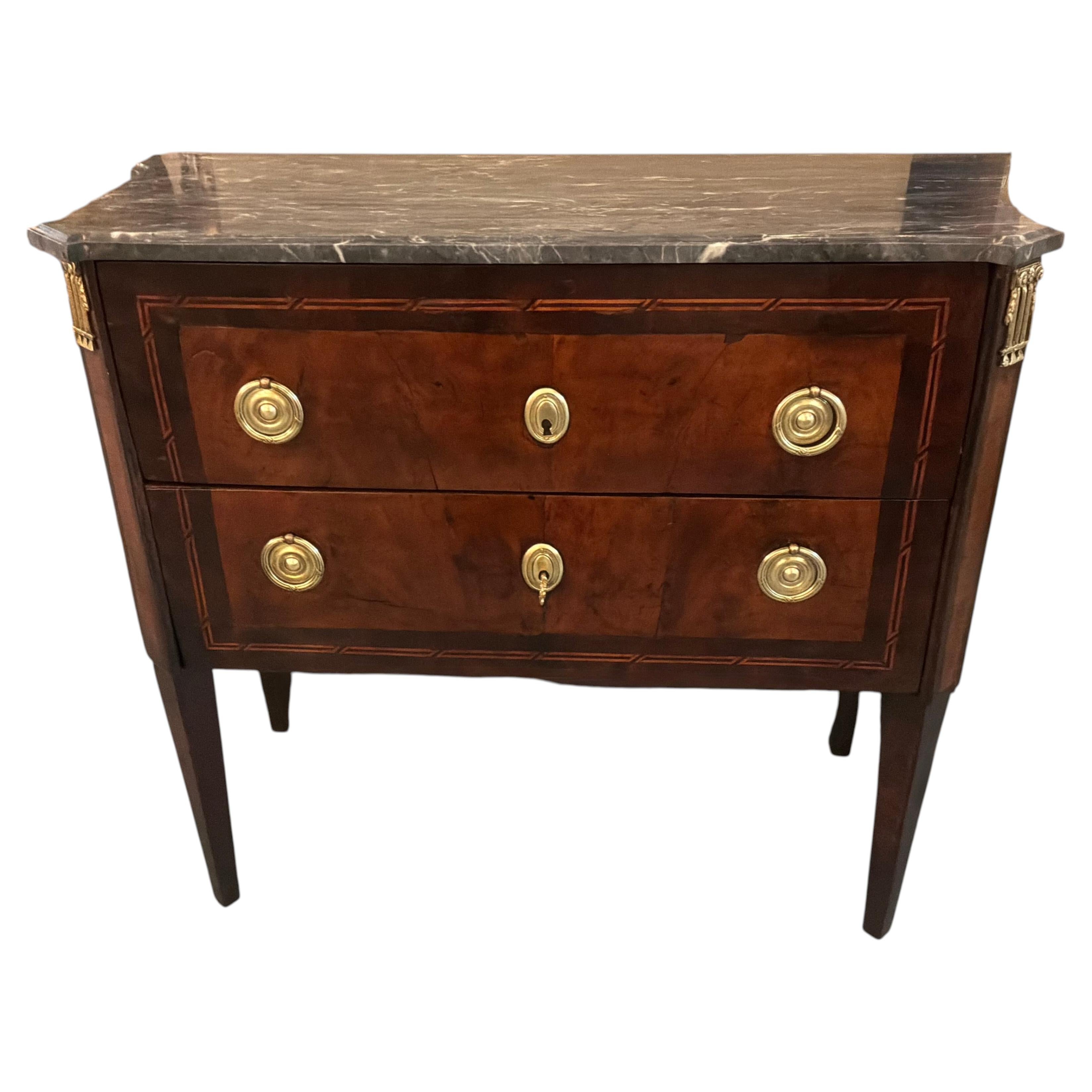 French Louis XVI style chest with marquetry and gilt mounts