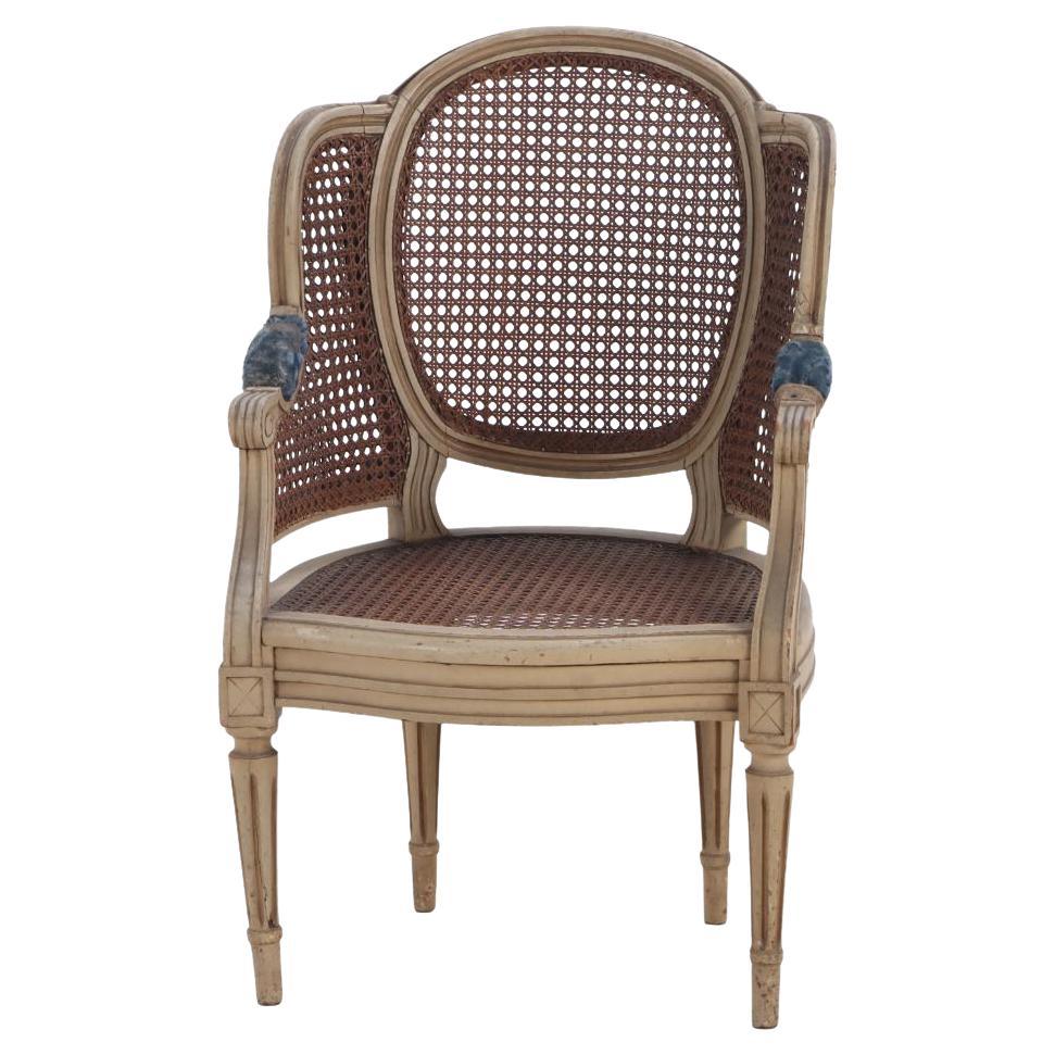 French Louis XVI style child's size painted Bergere chair,  C 1930.