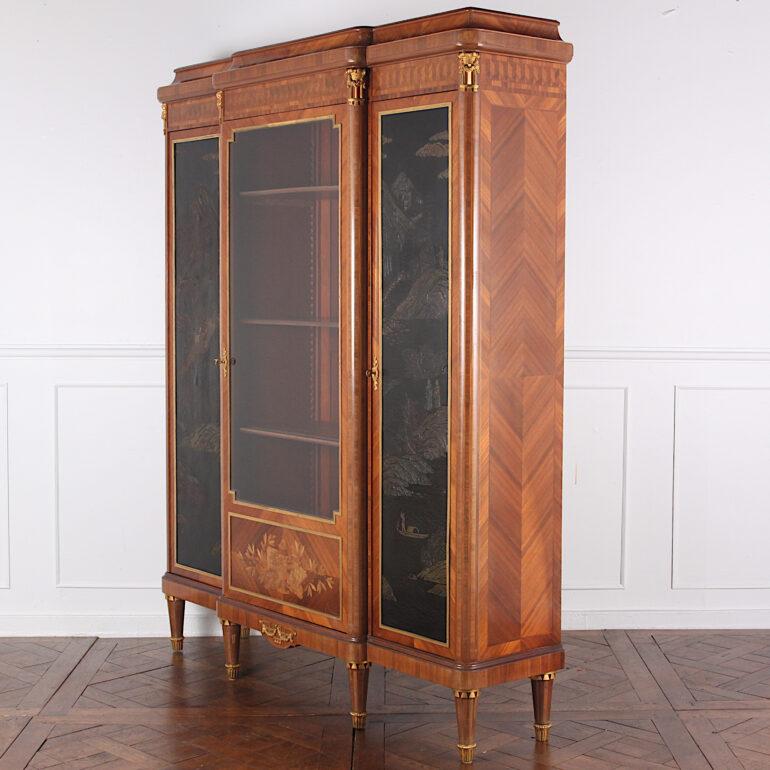 A lovely quality Louis XVI style French kingwood and marquetry three-door breakfront bookcase with ‘Japanned’ lacquer panels and finely-detailed gilt bronze mounts. Fully adjustable shelves in all three sections, circa 1900. Signed L. Bontemps,