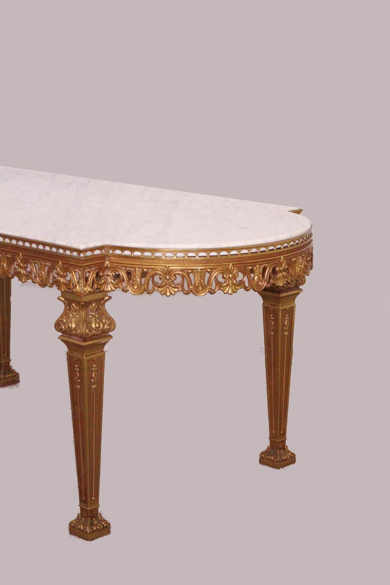 Coffee table gilt brass and marble French vintage Louis XVI style
Good quality heavy Gilt brass base
With shaped white variegated marble top
Very good vintage condition with only very minor signs of use for its age.