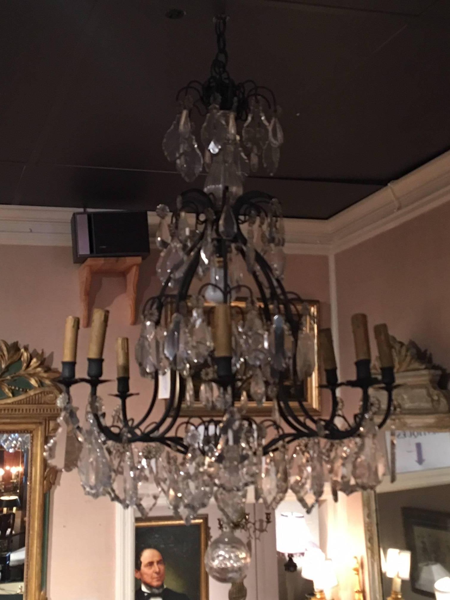 French Louis XVI style crystal and iron chandelier, 19th century.   US Wired
