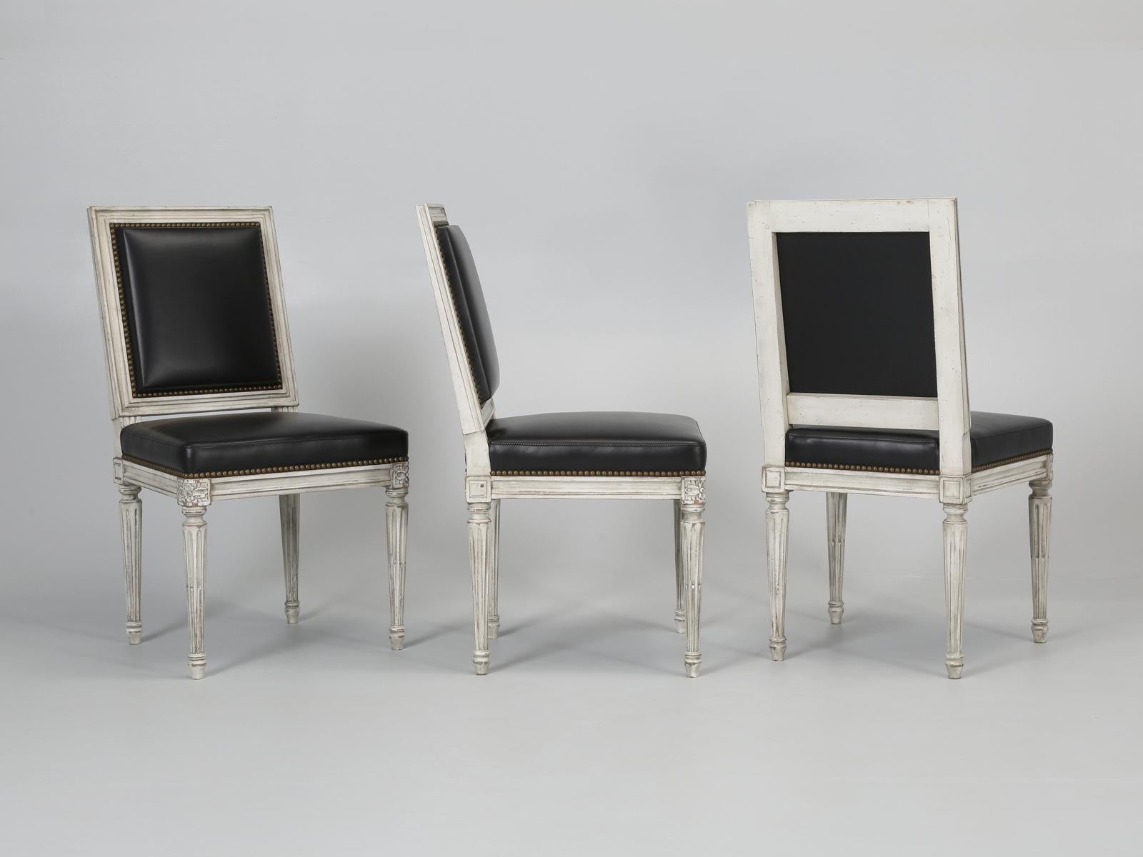 Hand-Crafted French Louis XVI Style Dining Chairs set of (8) in Black Leather, Antique Finish For Sale