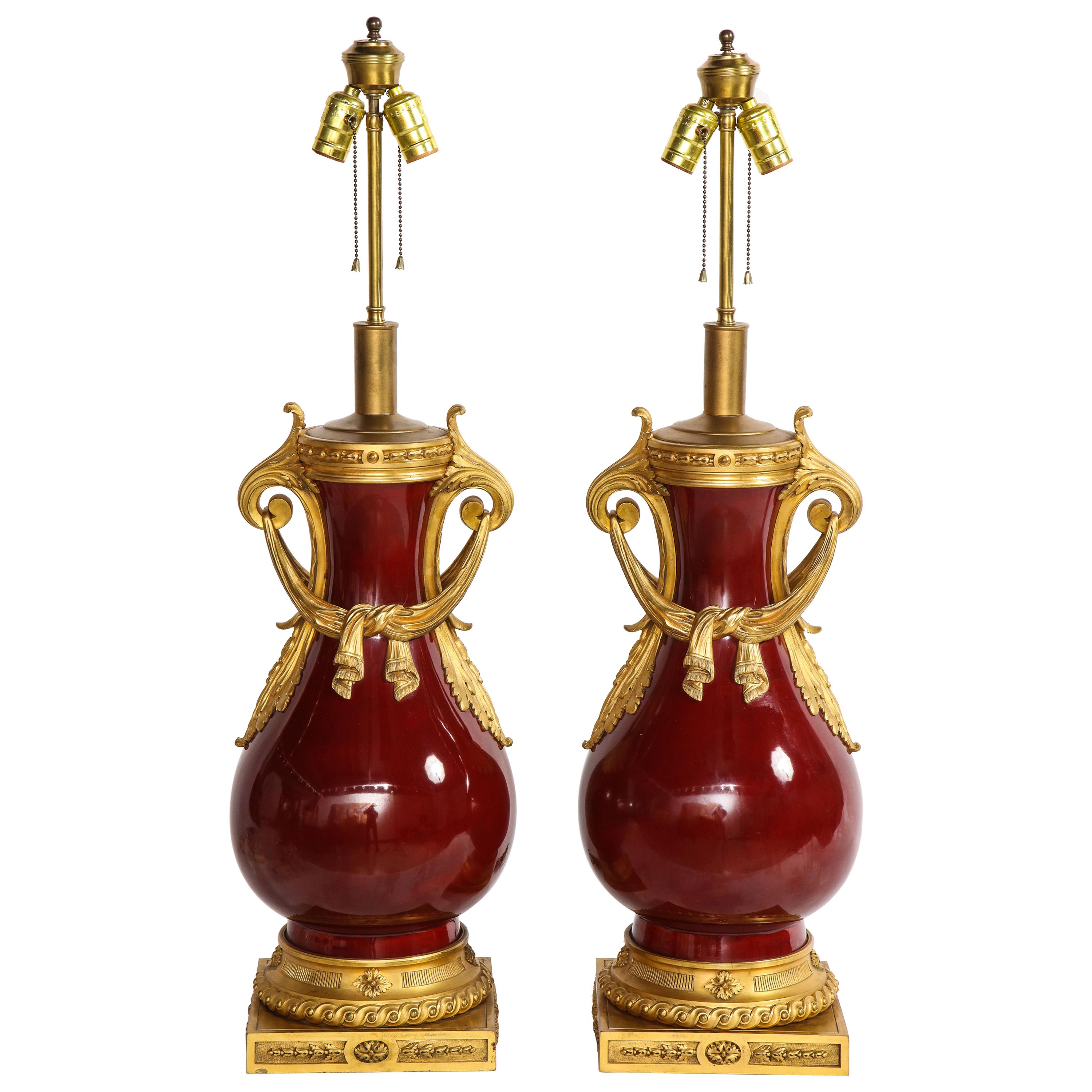 French Louis XVI Style Dore Bronze & Chinese Sang De Boeuf Porcelain Lamps, Pair