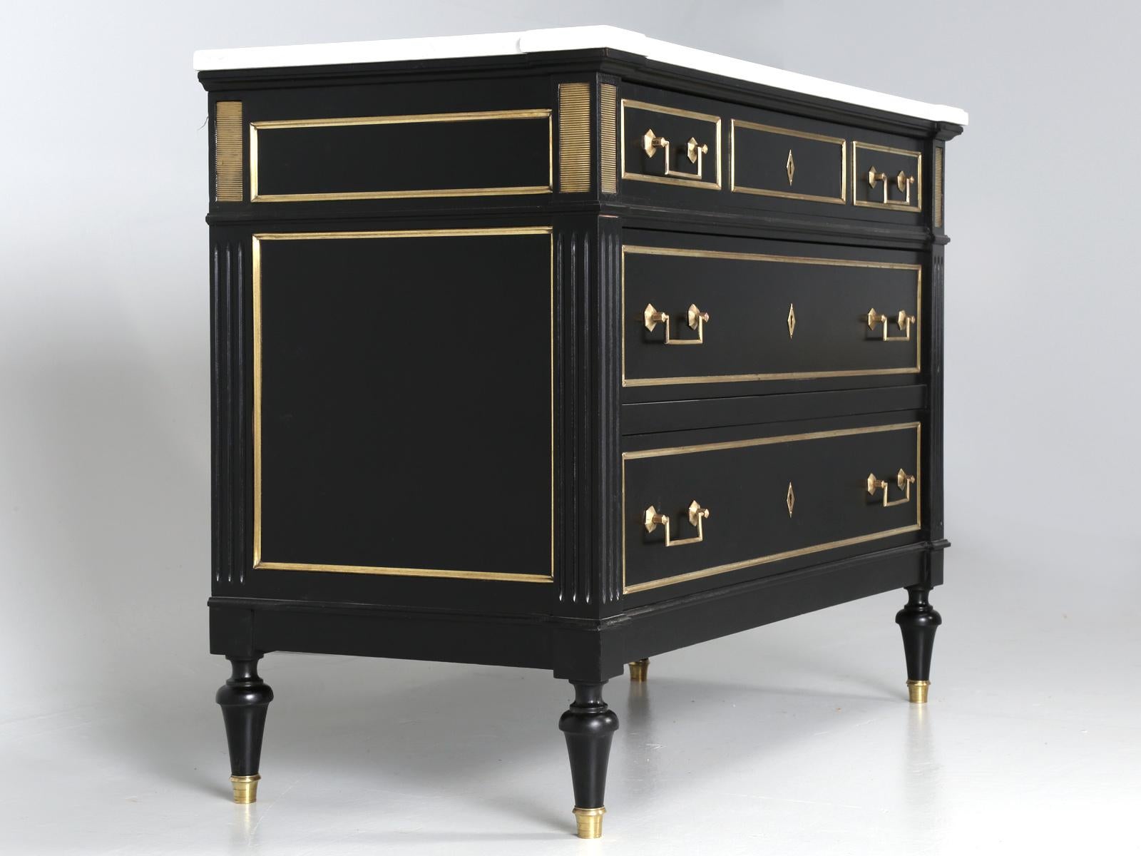 Antique French Louis XVI commode, or if prefer, dresser or even chest of drawers if you are English. Our Old Plank workshop, completely stripped this antique French commode down to the bare wood and slowly applied a proper ebonized black finish. The