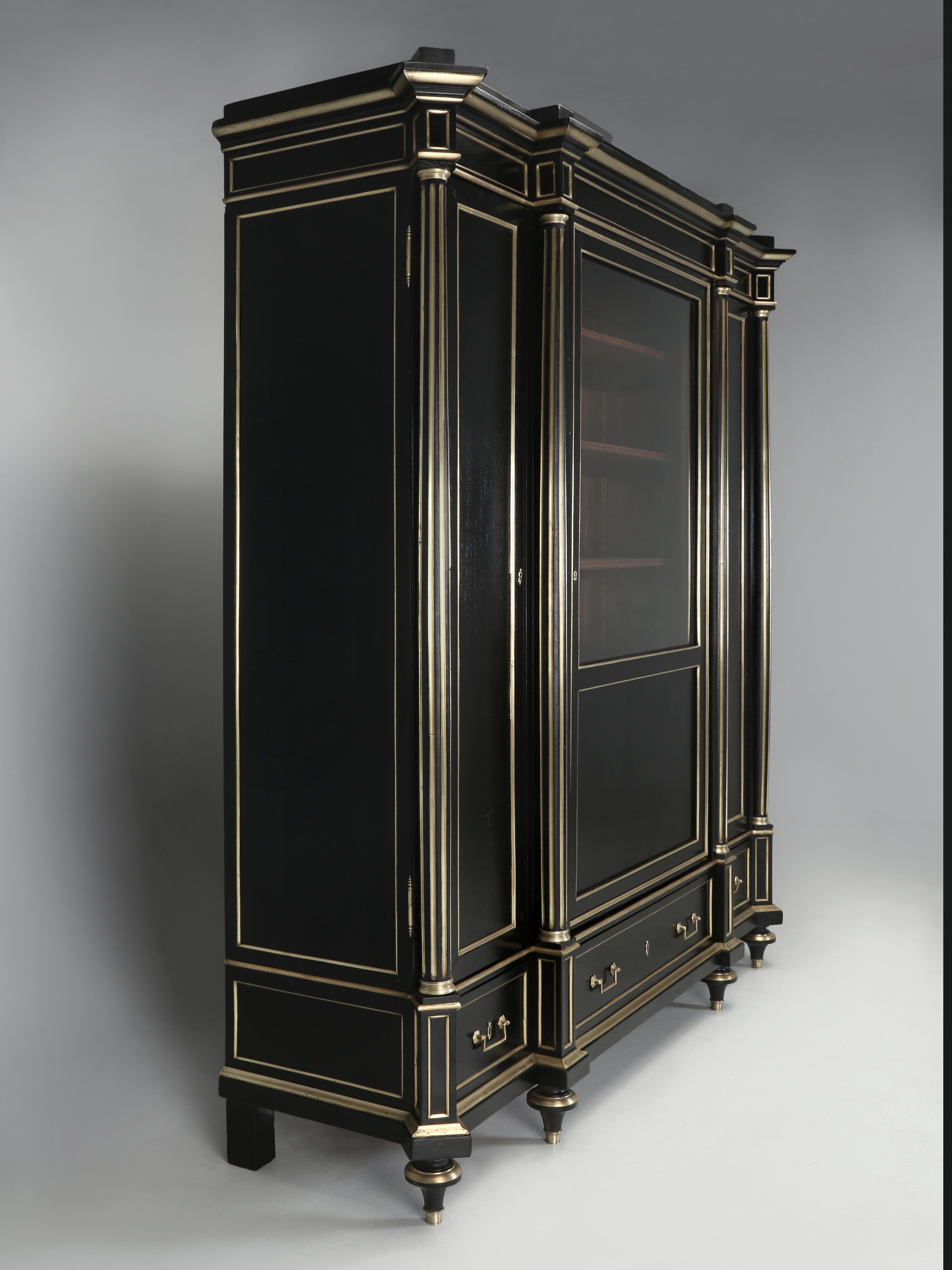 
Antique French Louis XVI Style Bookcase, or if you prefer, Antique French Ebonized Bibliotheque made from solid mahogany over 100-years ago to a very high standard. We have had our share of antique, or supposed to be Antique French mahogany Louis