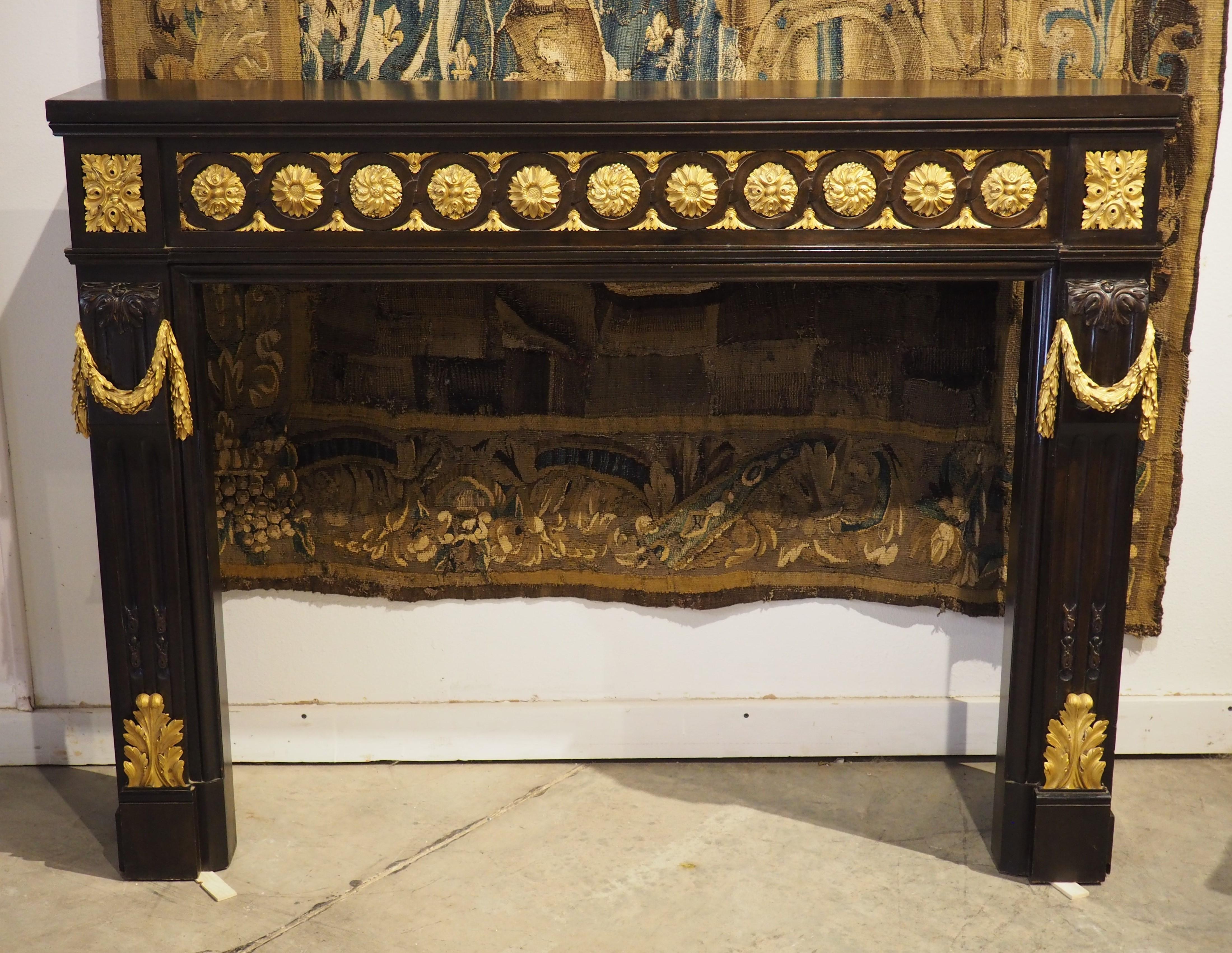 French Louis XVI Style Ebonized Wooden Mantel with Gilt Bronze Mounts, 20th C. For Sale 14