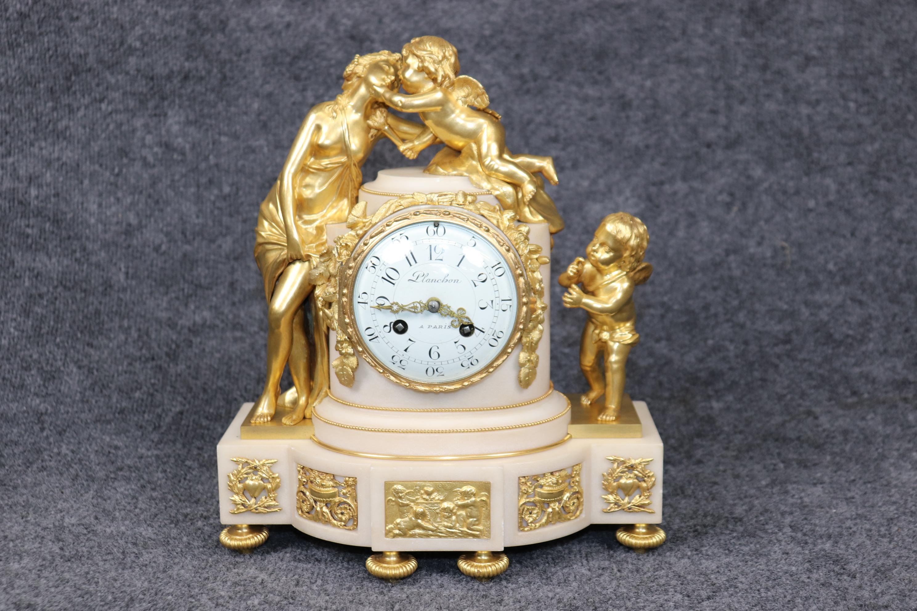 Cast French Louis XVI Style Figural Bronze Ormolu and Marble Clock Set By Planchon