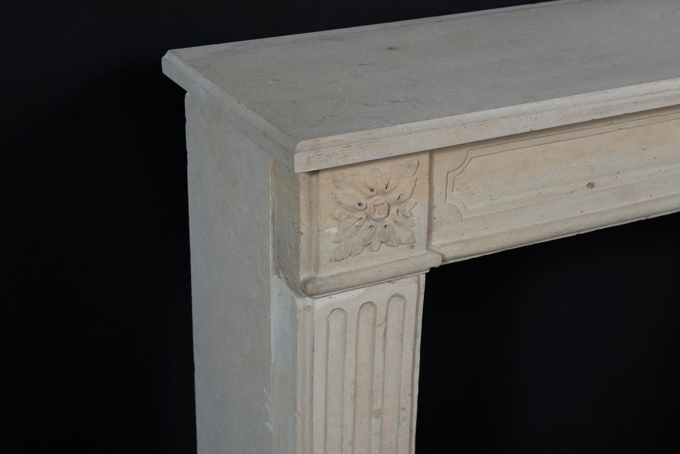 Limestone French Louis XVI Style Fireplace Mantel, 19th Century For Sale