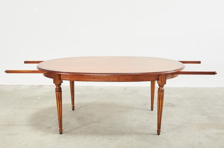 French Louis XVI Style Fruitwood Oval Dining Table with Leaves For Sale 4
