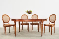 French Louis XVI Style Fruitwood Oval Dining Table with Leaves