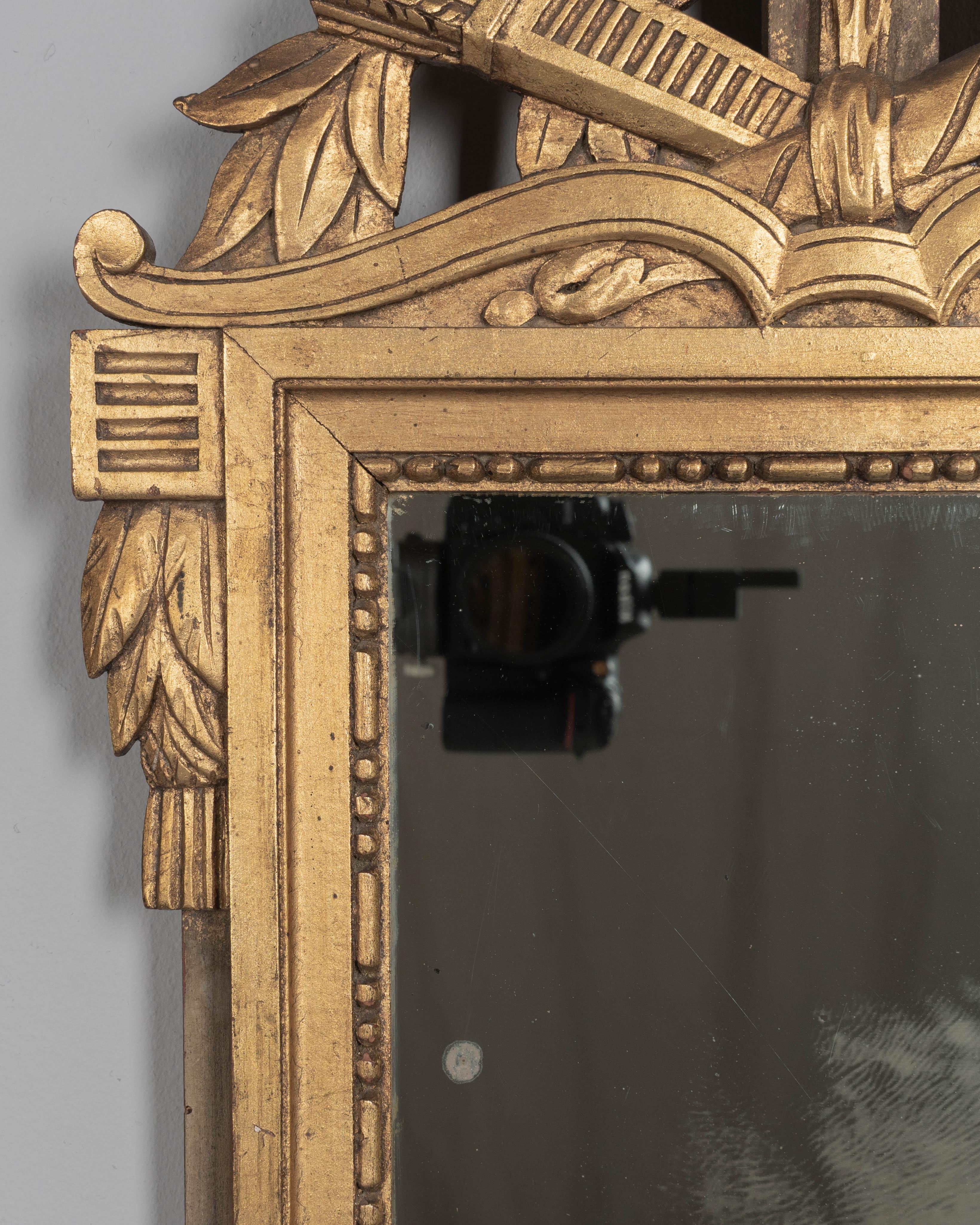 Hand-Carved French Louis XVI Style Gilded Mirror For Sale