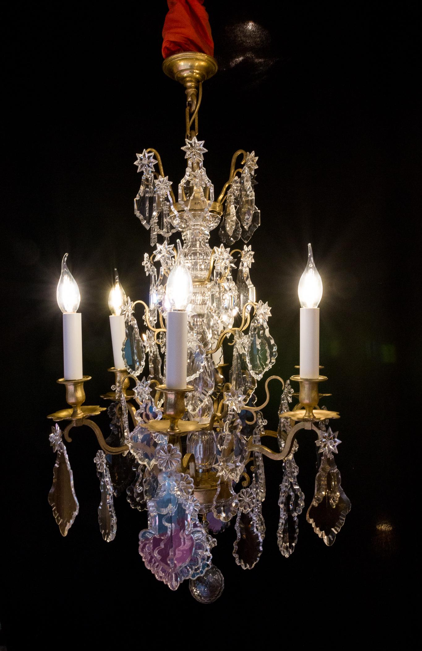 French Louis XVI style gilt-bronze and Baccarat crystal chandelier, circa 1880.

An elegant and decorative gilt-bronze and cut crystal chandelier in the classic French Louis XVI style, attributed to The Cristalleries de Baccarat.
Our chandelier